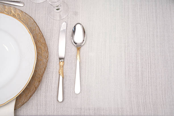 top view of stylish elegant table setting on light background. copy space for text