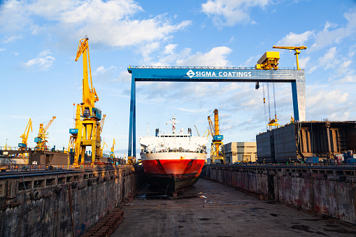 Constanta, Romania - 03.03.2021: The deck of an empty dry dock at a shipyard in Constanta, Romania.