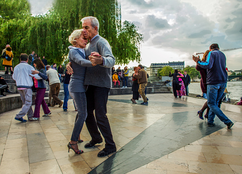 05-15-2016 Paris, France.  Dancing Tango  (you remember movie Last tango in Paris)?  on embankment of Paris Beautiful May in Paris. Seine river next to