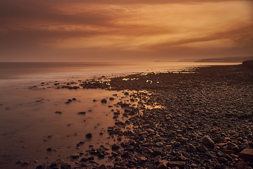 Orange sunset in Maspalomas Beach, Canary Islands