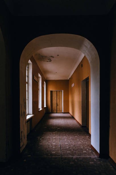 istock Dark creepy corridor of abandoned building 1475975954