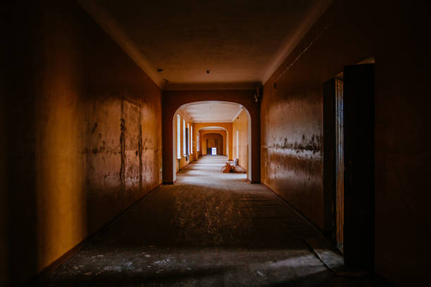 istock Dark creepy corridor of abandoned building 1475976015