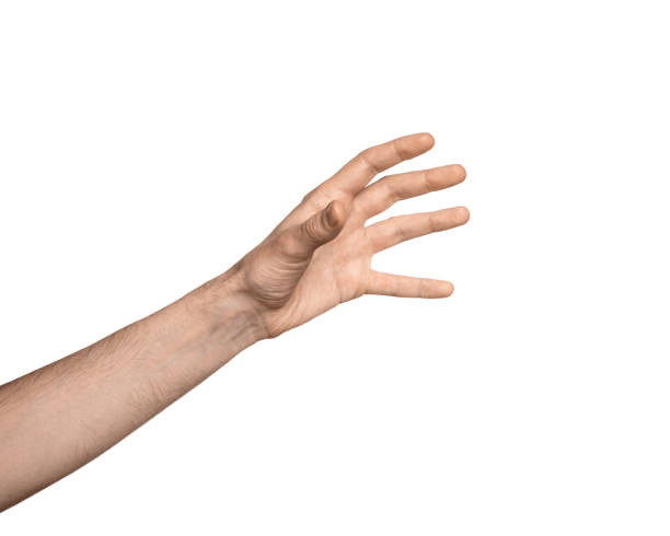 Man's hand holding something. Hand is reaching out for catch or take and grab something. stock photo