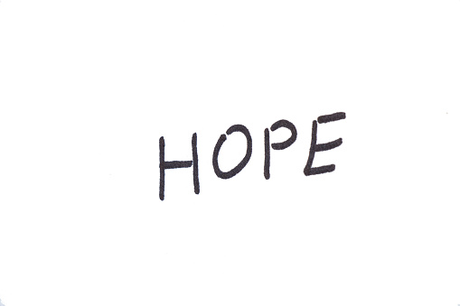 handwritten hope in english written in black marker