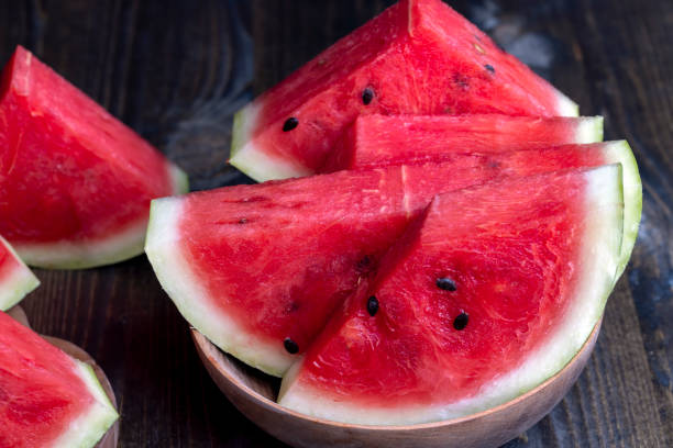 istock Sliced red and ripe watermelon on the table 1475987690