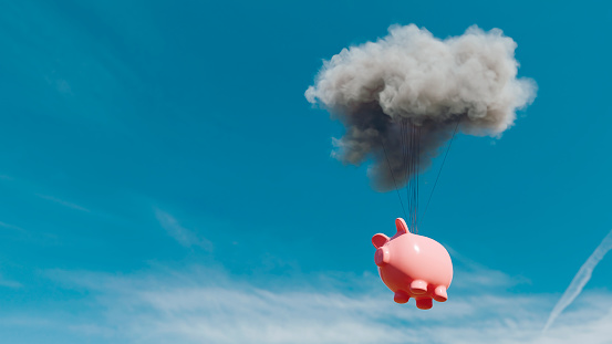 Piggy bank connected to cloud flys through the air