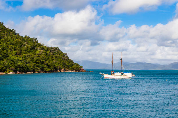 istock Sailing yacht moored in calm bay on a sunny day 1475993068