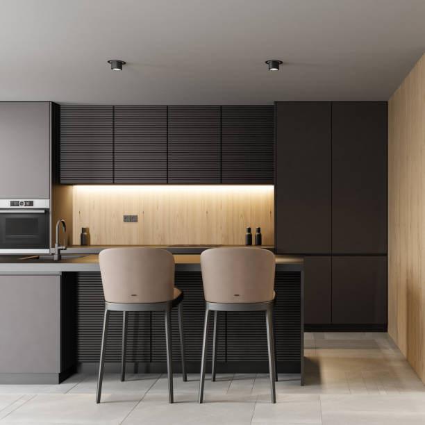 istock Modern minimalist kitchen with long island with stools. Oak wood and dark cabinets. 1475994735