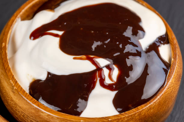 istock Fresh Yogurt with added chocolate for chocolate flavor 1476000323