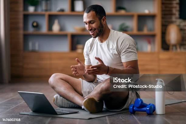 Remote Trainings Young Black Guy Having Video Call With Sport Coach Stock Photo - Download Image Now