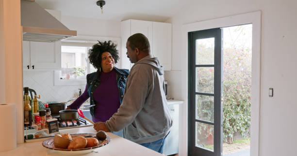 istock African American Couple Talking In The Kitchen 1476004263