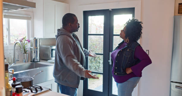 istock Middle Aged African American Couple Argue Inside a Kitchen 1476005504