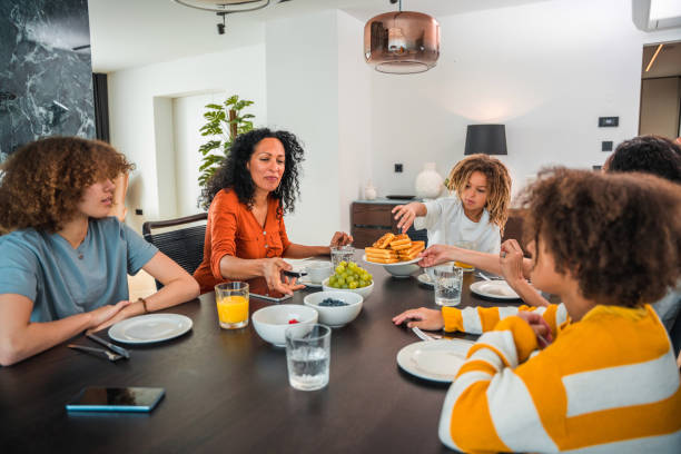 istock Diverse Family Enjoying Breakfast Together 1476008820