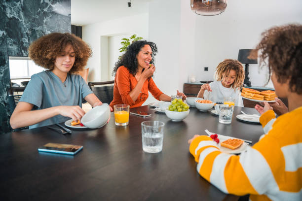 istock Diverse Family Enjoying Breakfast Together 1476008823