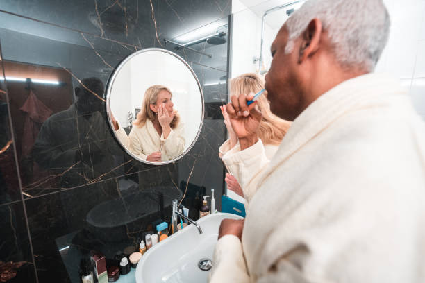 istock Diverse Mature Couple Getting Ready In The Bathroom 1476011726