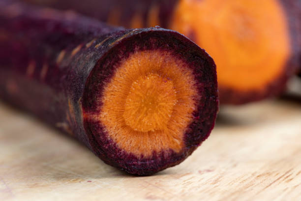 Sliced purple-orange carrots on the table