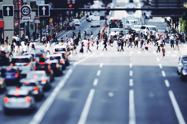 Many people walking in the downtown area