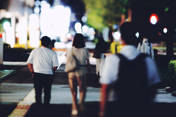 People walking in the night city