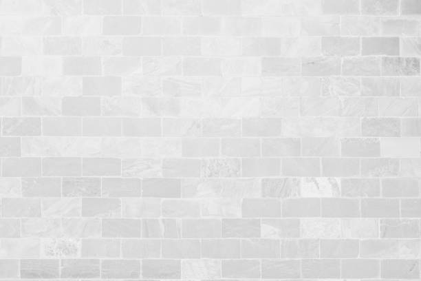 istock White grunge brick wall texture background for stone tile block painted in grey light color wallpaper modern interior and exterior and room backdrop design 1476021970