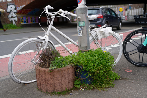 Cologne, Germany March 22, 2023: Ghost Bike roadside memorial to a cyclist killed on the road in cologne ehrenfeld