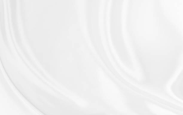 istock White gray satin texture that is white silver fabric silk background with beautiful soft blur pattern natural. 1476035913