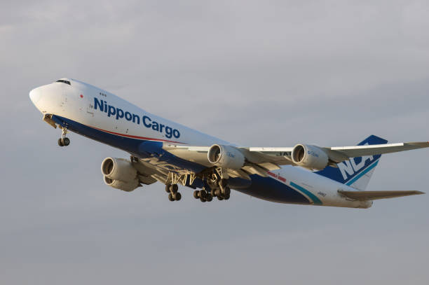 Nippon Cargo Airlines NCA Boeing 747 Los Angeles, California, United States: Nippon Cargo Airlines Boeing 747-8KZ cargo jet with registration JA14KZ shown departing from LAX, Los Angeles International Airport. nippon cargo airlines photos stock pictures, royalty-free photos & images