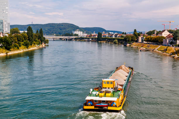 istock Self propelled barge carrying construction material in River Rhine, Basel, Switzerland 1476066063
