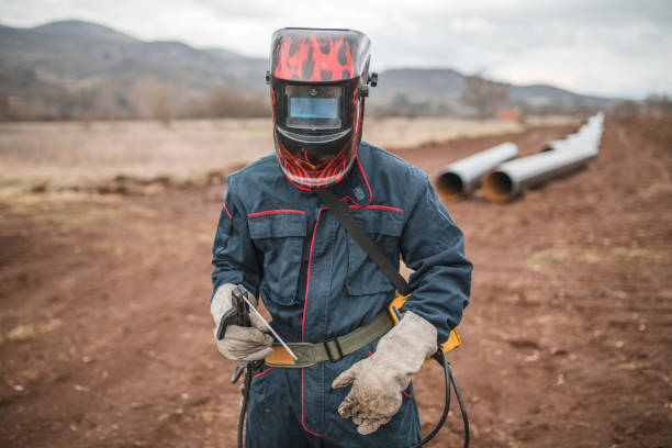 istock A welder uses welding equipment while working on a gas pipeline inspection 1476076142