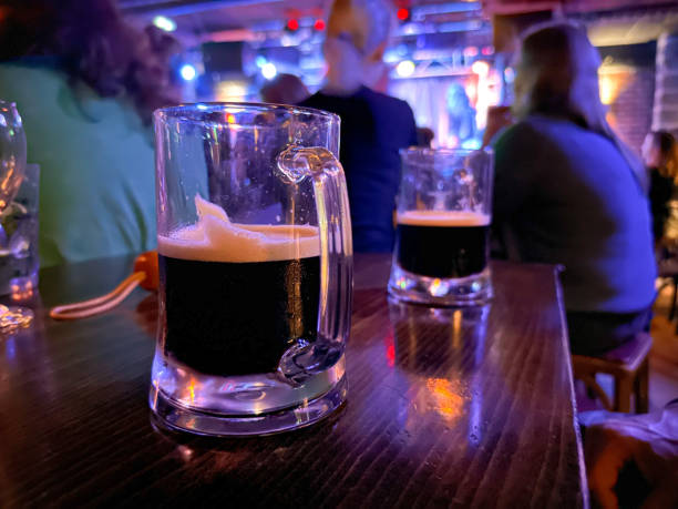 istock Mug of dark beer in irish pub 1476097575