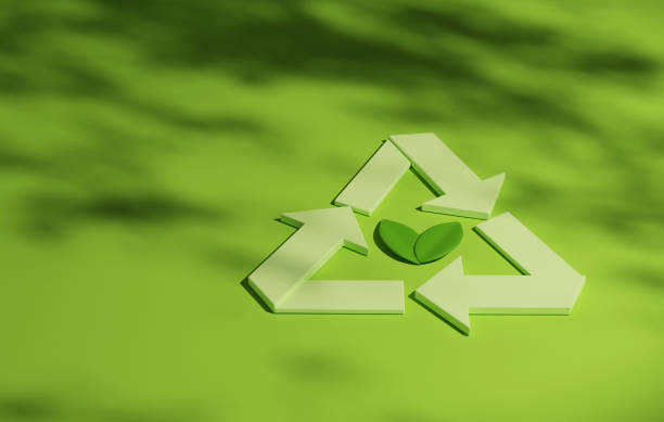 istock Recycle symbol and green tree sapling on green background. 1476102444