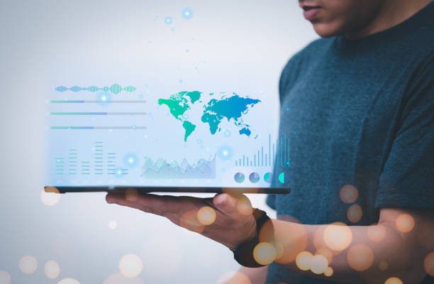 istock Businesses use phones to virtual hologram data graphs online. with internet technology concept of global data connection with technology internet big data searching for information online marketing 1476111958