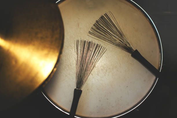istock Drumsticks brushes resting on the snare drum 1476114561
