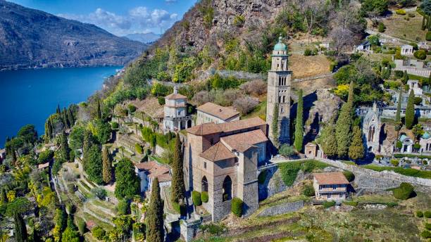 Santa Maria del Sasso, Morcote Scenic HDR-drone shot of church Santa Maria del Sasso in Morcote, TI with lake Lugano in the background lugano stock pictures, royalty-free photos & images