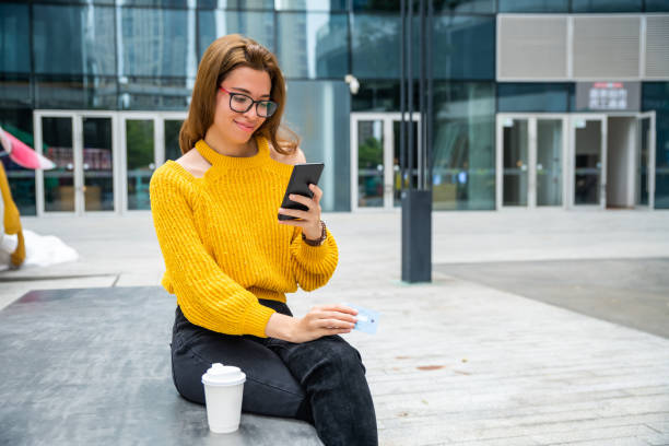 istock Young woman shopping on-line 1476118781