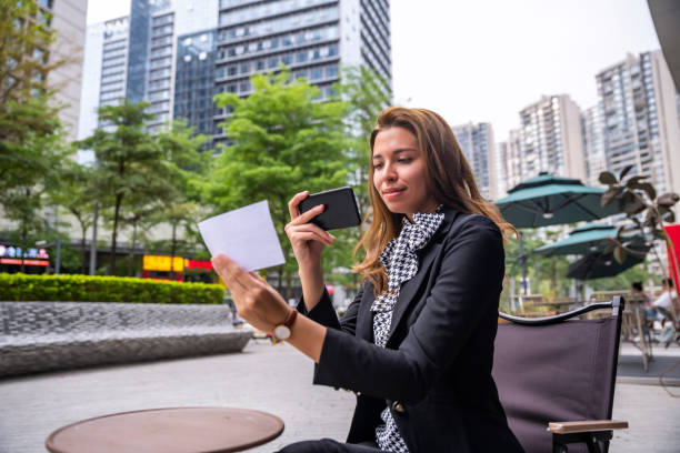 istock Hispanic Woman Tracking Restaurant Bill 1476119016