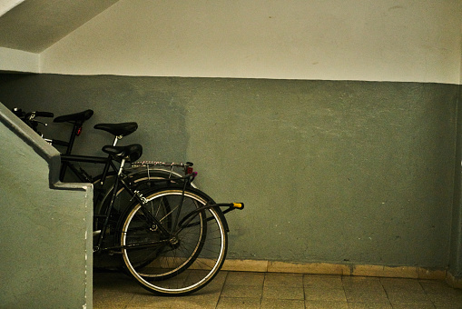 bicycles under the stairs