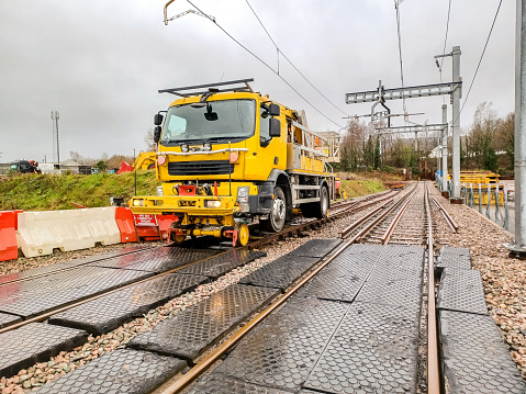 An engineering plant vehicle used to travel on the passenger / freight railway tracks giving access to engineers to work on the railway infrastructure so they can make upgrades and repairs easily.