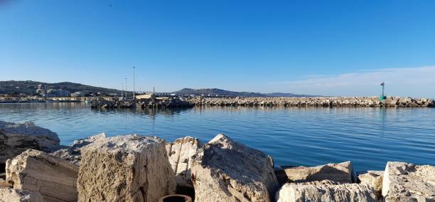 istock Reflections on the water of the port 1476127586