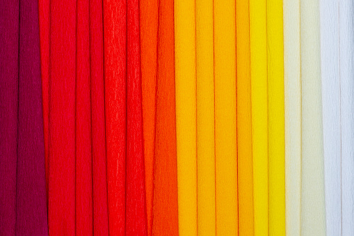 Rolls of crepe paper with bright and vivid colors.