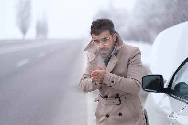 istock Handsome Man Standing Near Car With Open Hood 1476130669