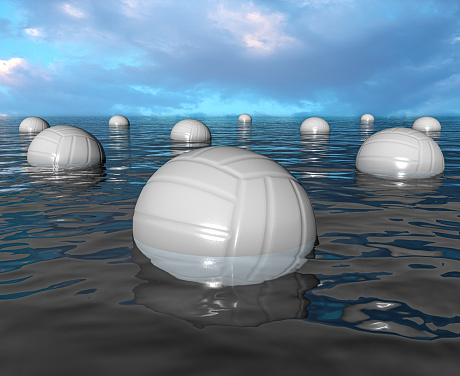 Close-up of buoys floating in water