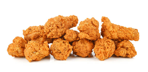 istock Fried spicy chicken isolated on white 1476139165