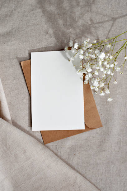 istock Empty paper card with copy space on beige background, elegant business, branding template, congratulation letter mockup 1476139417