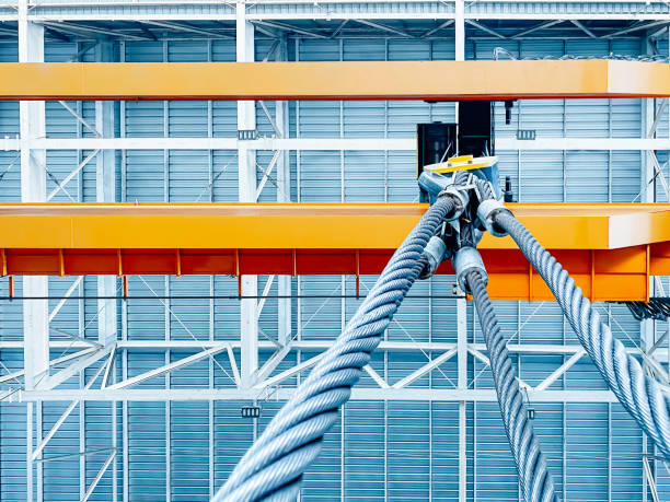 istock Overhead crane inside factory building, industrial background. 1476142237
