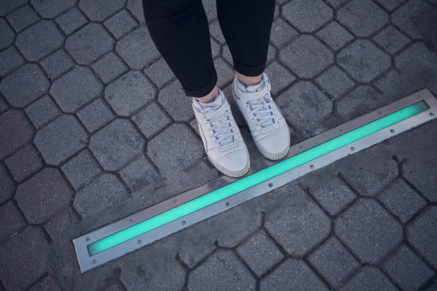 istock Integrated crosswalk stoplight for pedestrians in asphalt. 1476144305