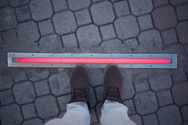 istock Integrated crosswalk stoplight for pedestrians in asphalt. 1476144387