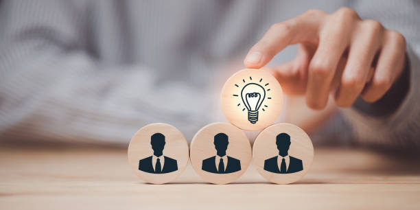istock Human hand pointing at a wooden block,Finding new solutions to solve business problems,innovation and brain power from brainstorming,Finding Creativity and Inspiration,successful business ideas 1476170307