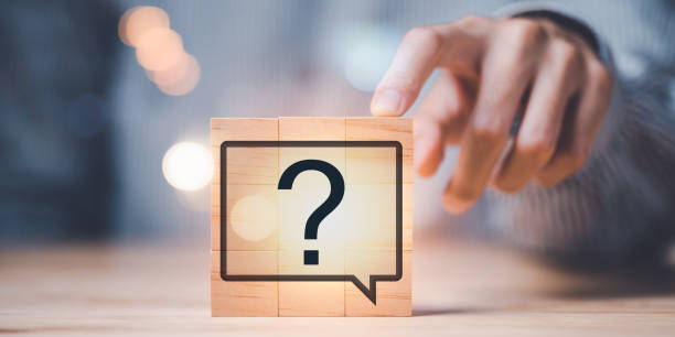 istock Question mark on wooden block, Questioning concepts, why, where, when, how, who ,to find the answer , and ask for help to solve the problem,Finding new solutions to solve business problems 1476170308