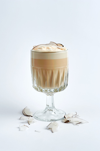 Raf coffee with chips in a glass, white background, product photography