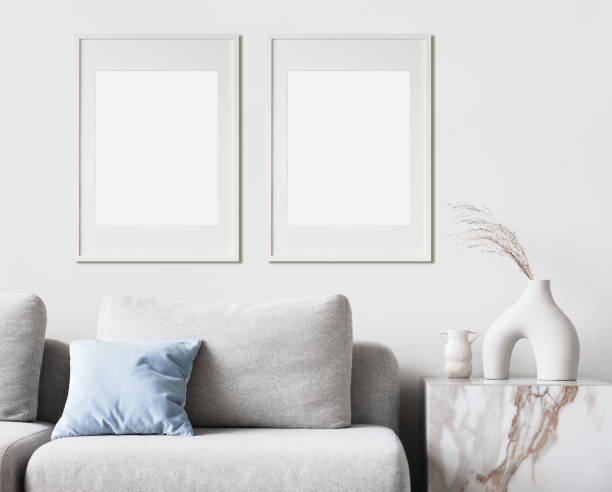 istock Two blank picture frames on a wall. Artwork mockups in interior design. Vertical orientation 1476174969